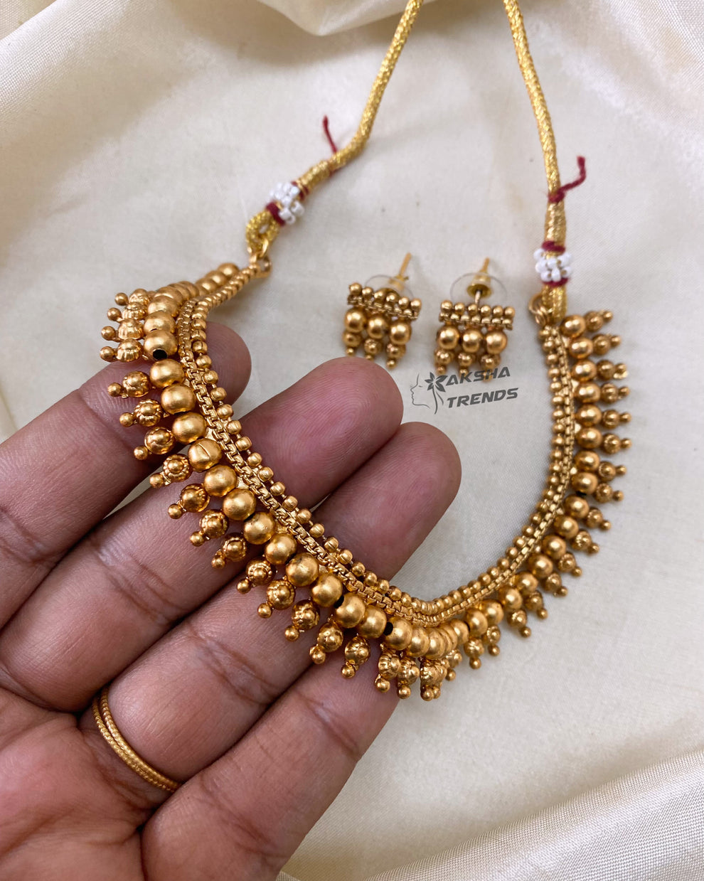 Golden bead necklace Aksha Trends