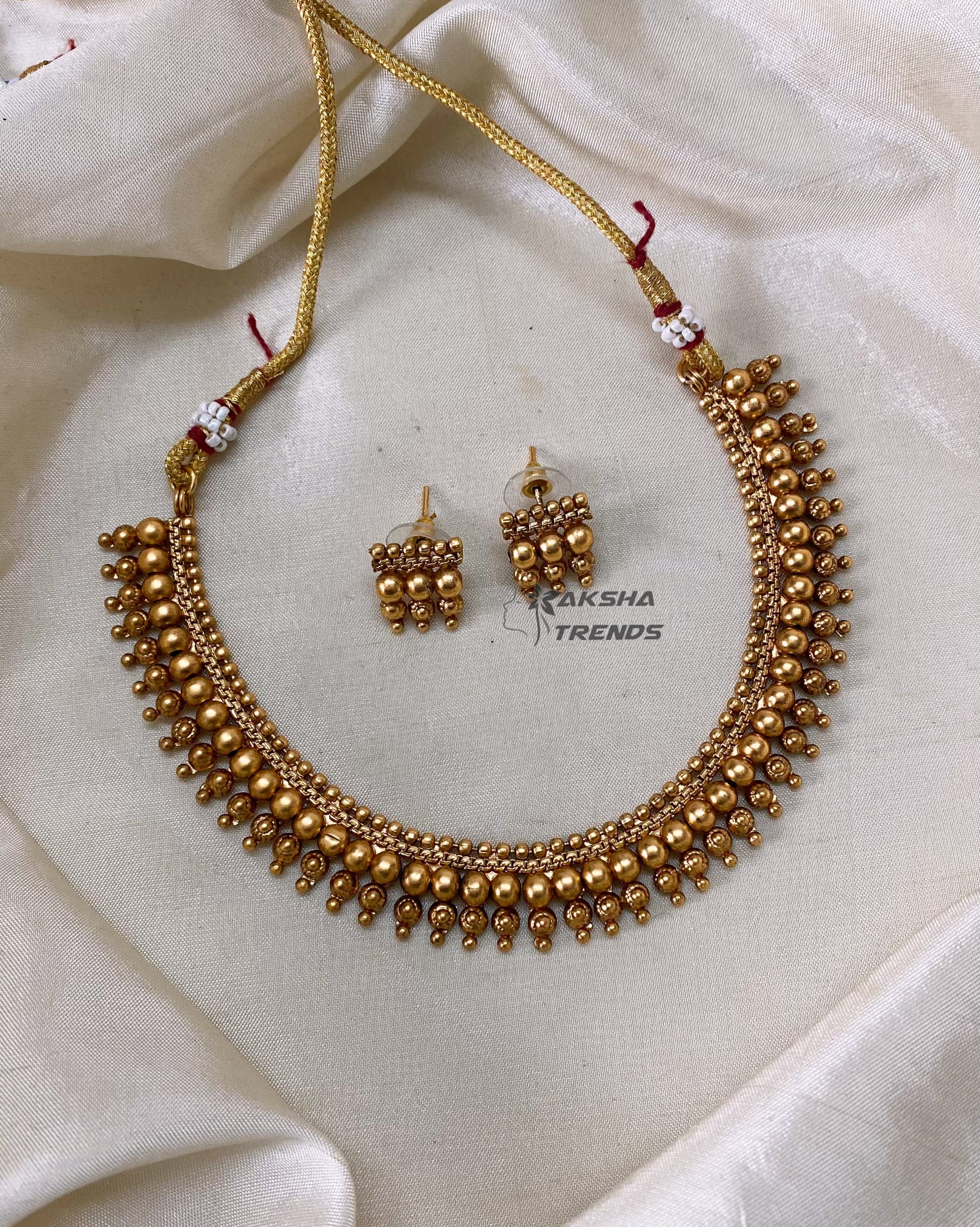 Golden bead necklace Aksha Trends