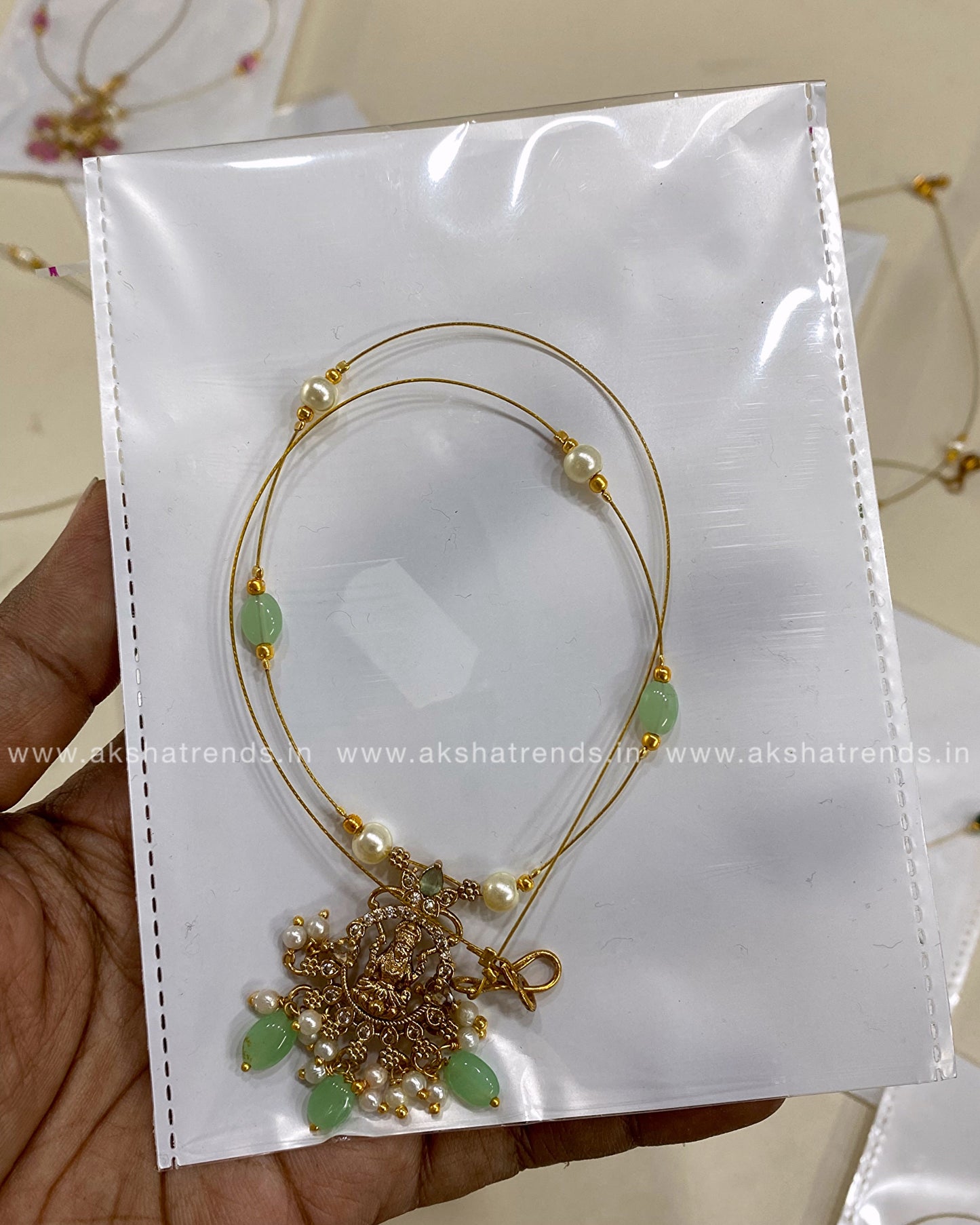 Invisible Necklace -lakshmi blue Aksha Trends