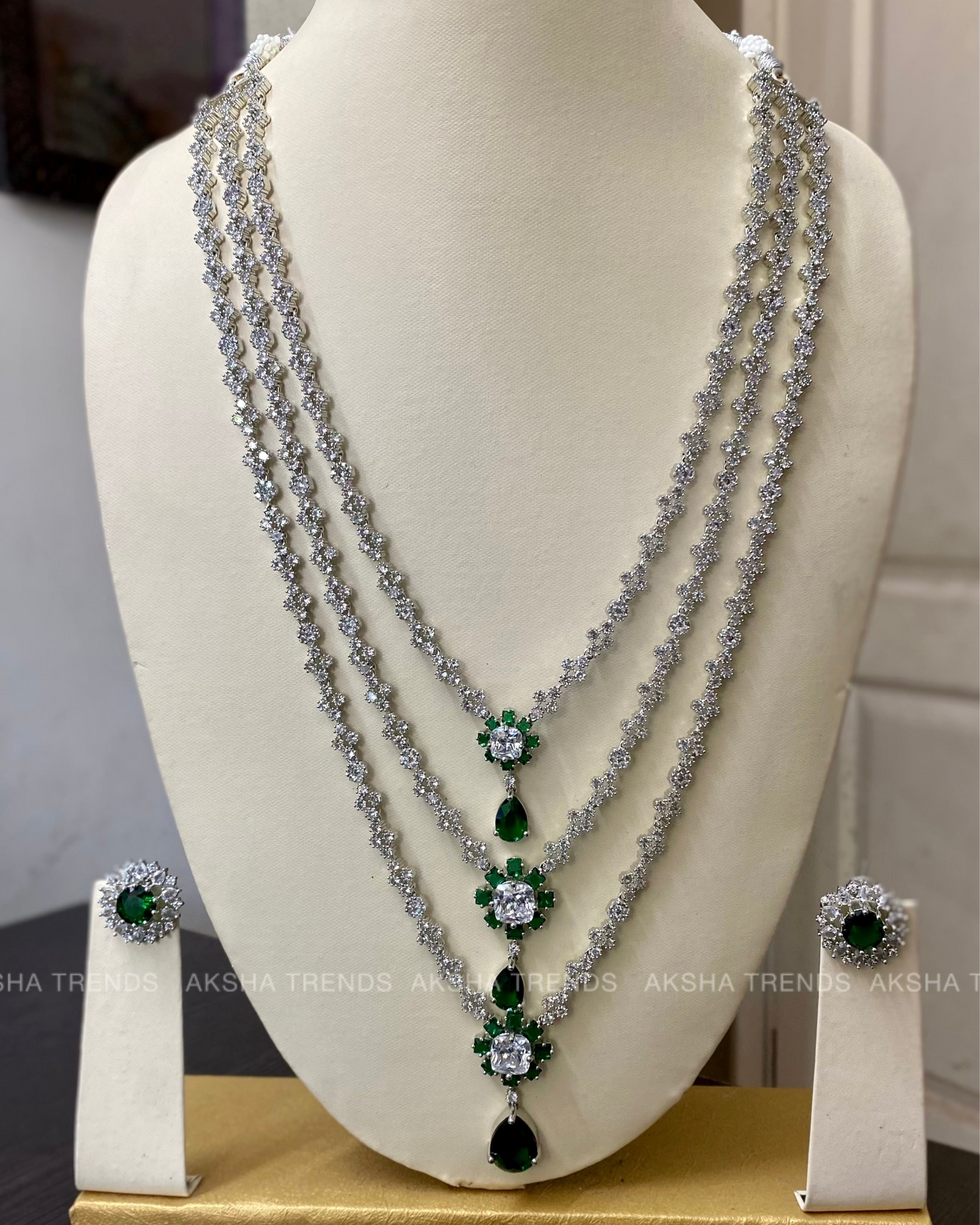 Nita Ambani -3 layer emerald diamond haram Aksha Trends