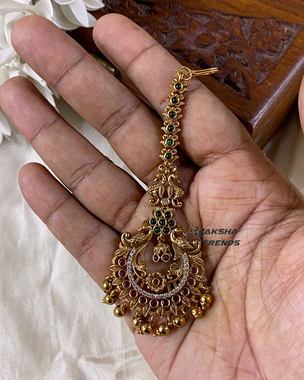 Premium gold tikka Aksha Trends 