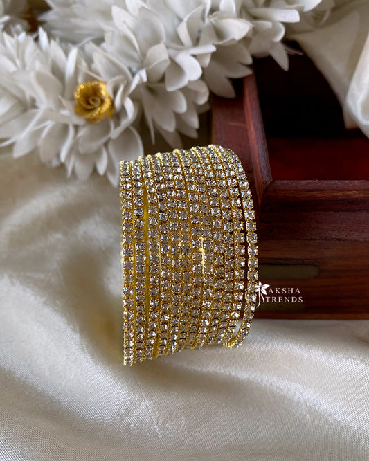Kids gold stone fancy bangles (12pc) Aksha Trends