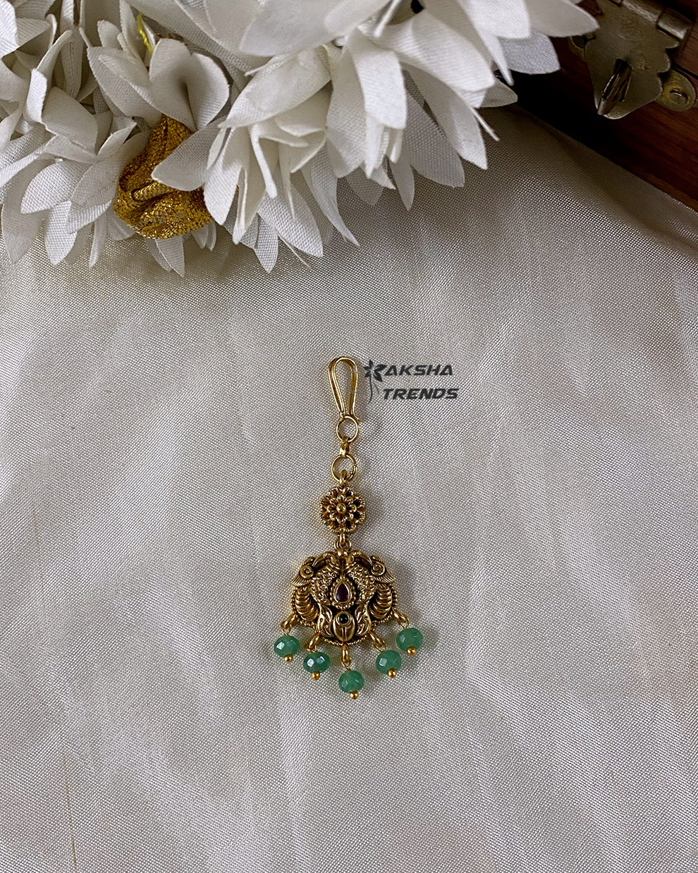 Premium gold tikka Aksha Trends 