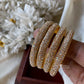 Kids gold stone fancy bangles (4pc) Aksha Trends