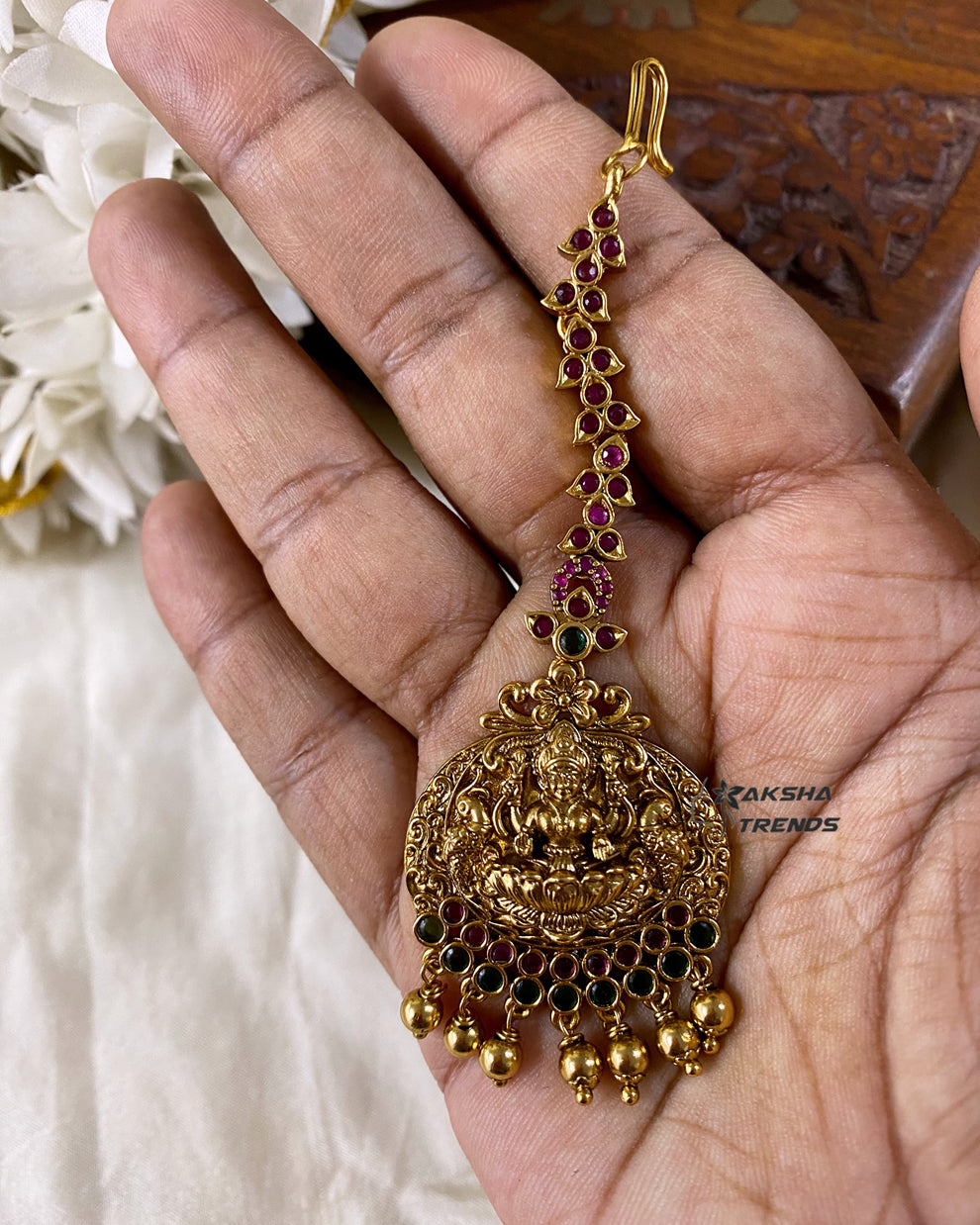 Premium gold tikka Aksha Trends 