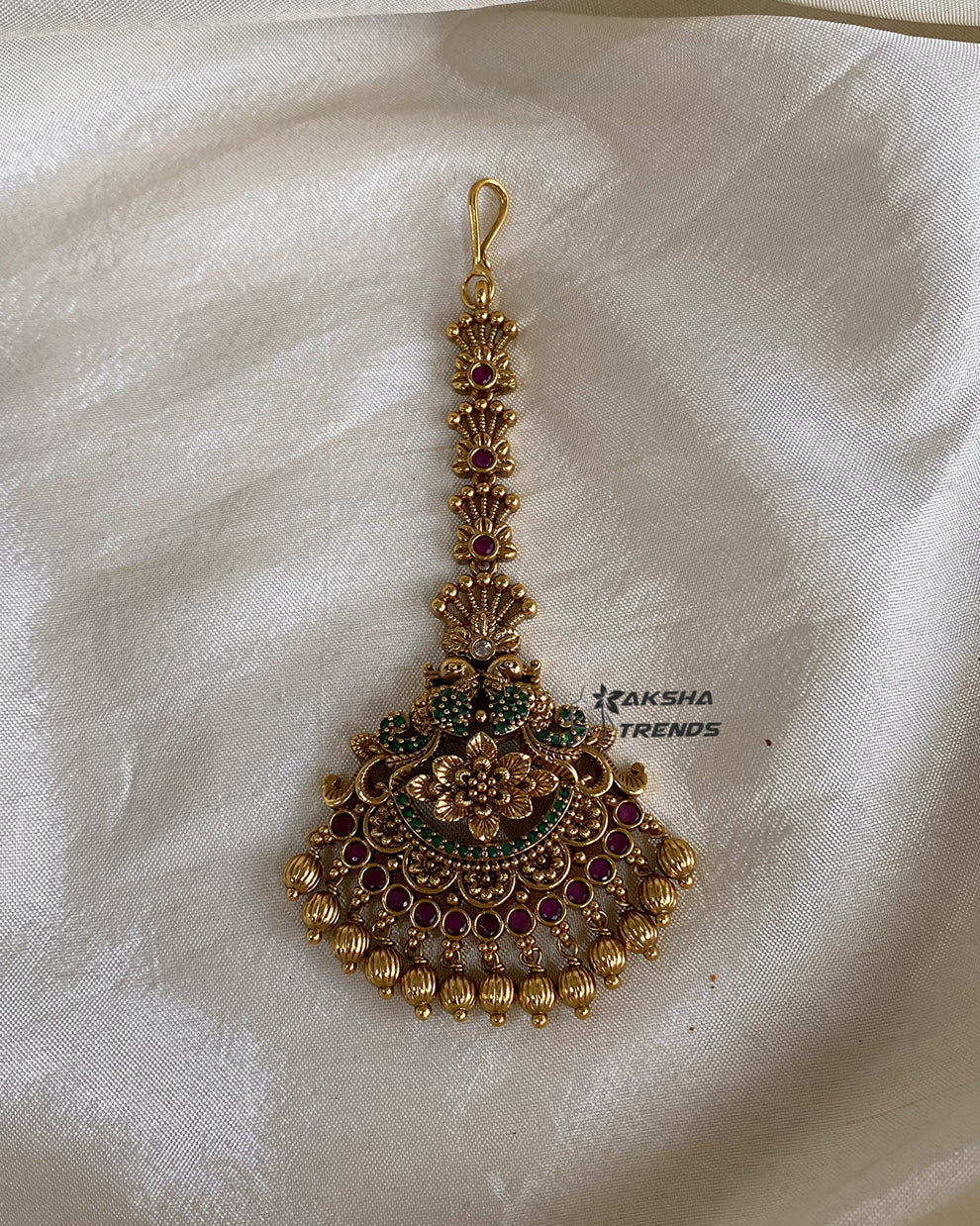 Premium floral tikka Aksha Trends 