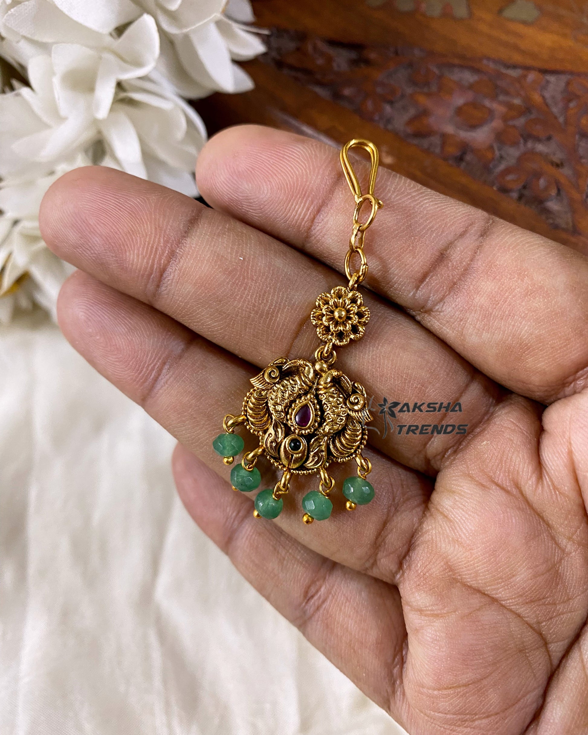 Premium gold tikka Aksha Trends
