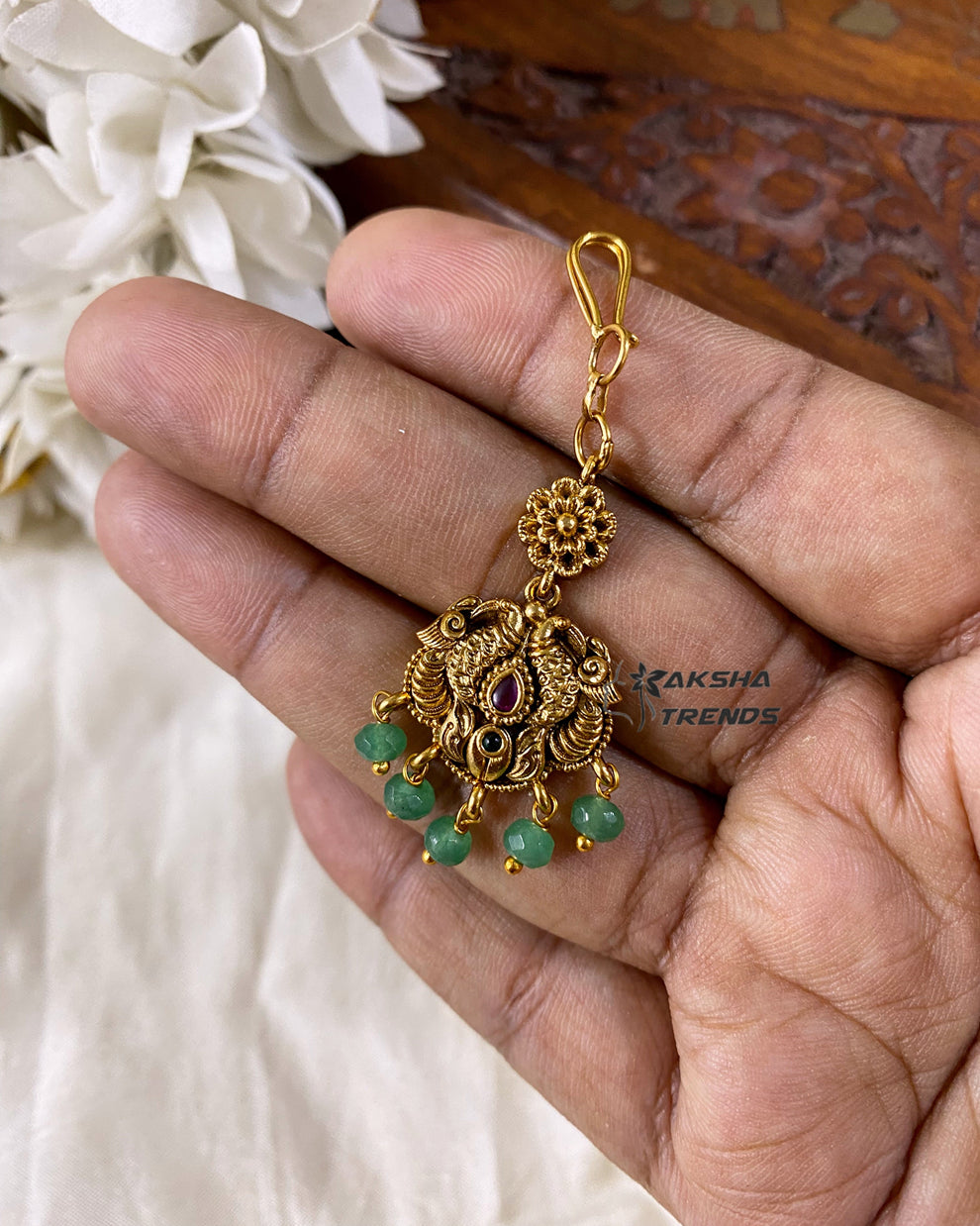Premium gold tikka Aksha Trends 