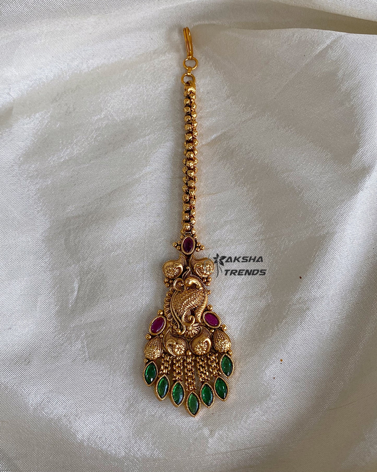 Premium gold tikka Aksha Trends