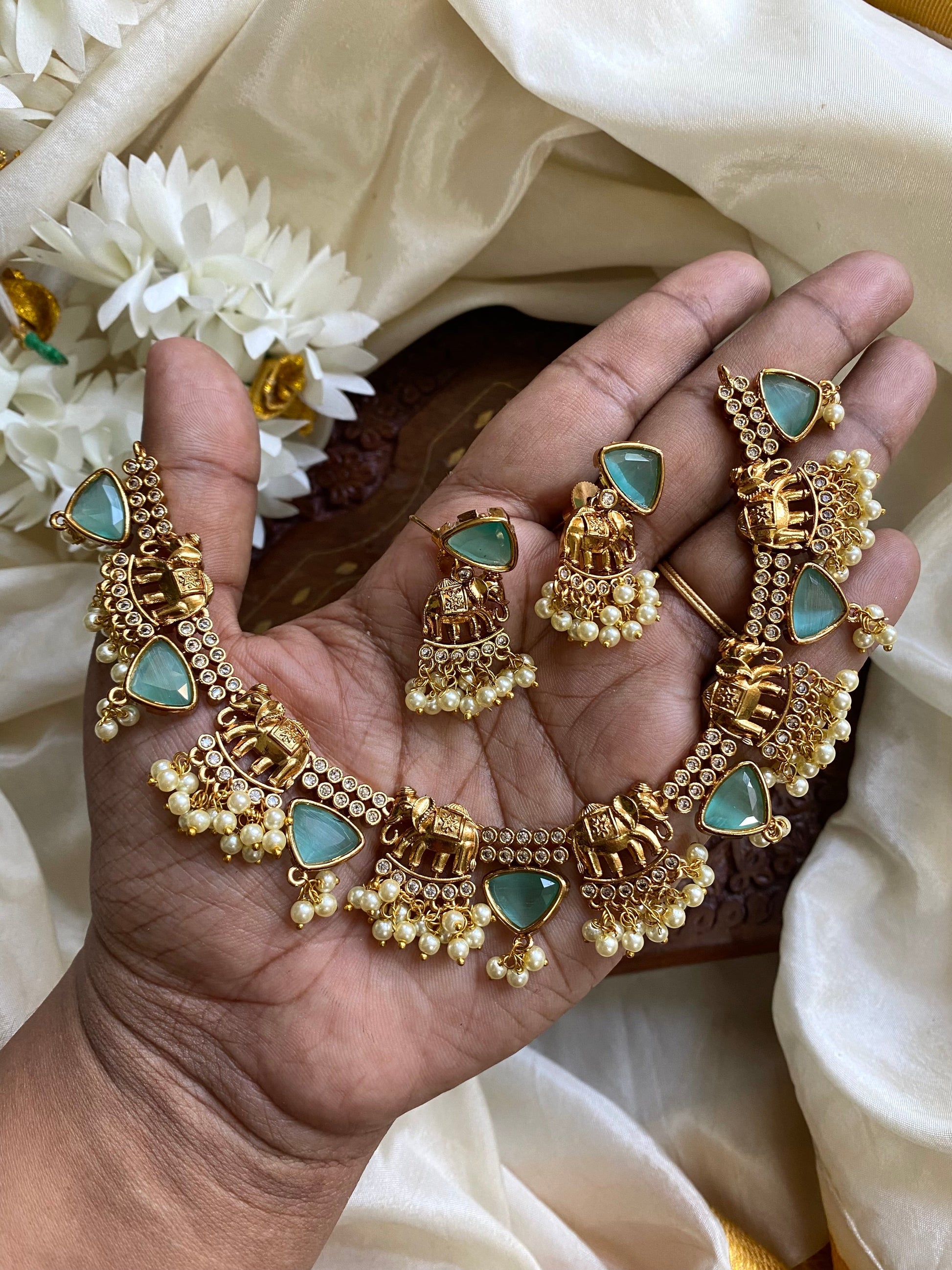 Golden Elephant Necklace -Blue Aksha Trends
