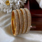 Kids gold stone fancy bangles (4pc) Aksha Trends