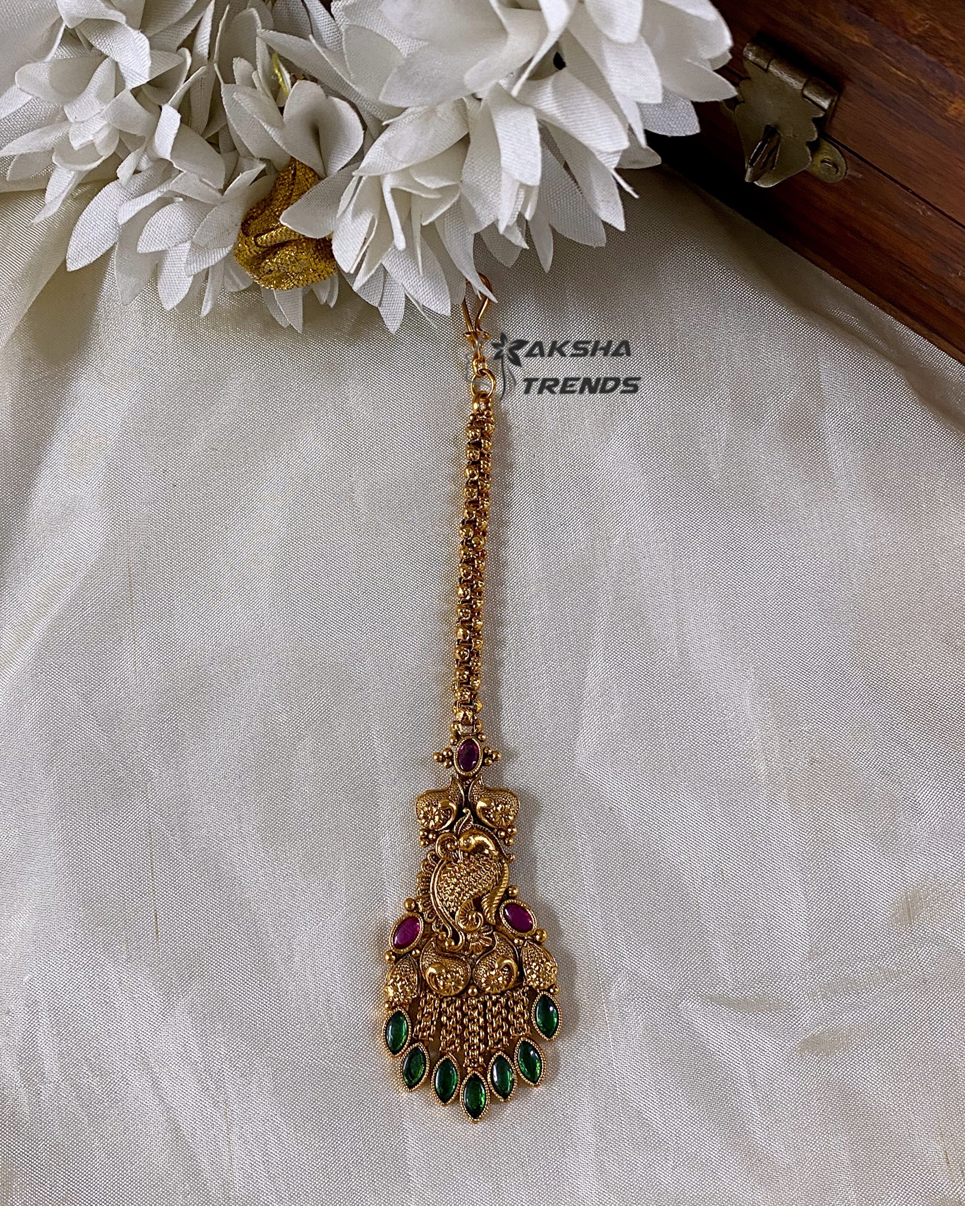 Premium gold tikka Aksha Trends