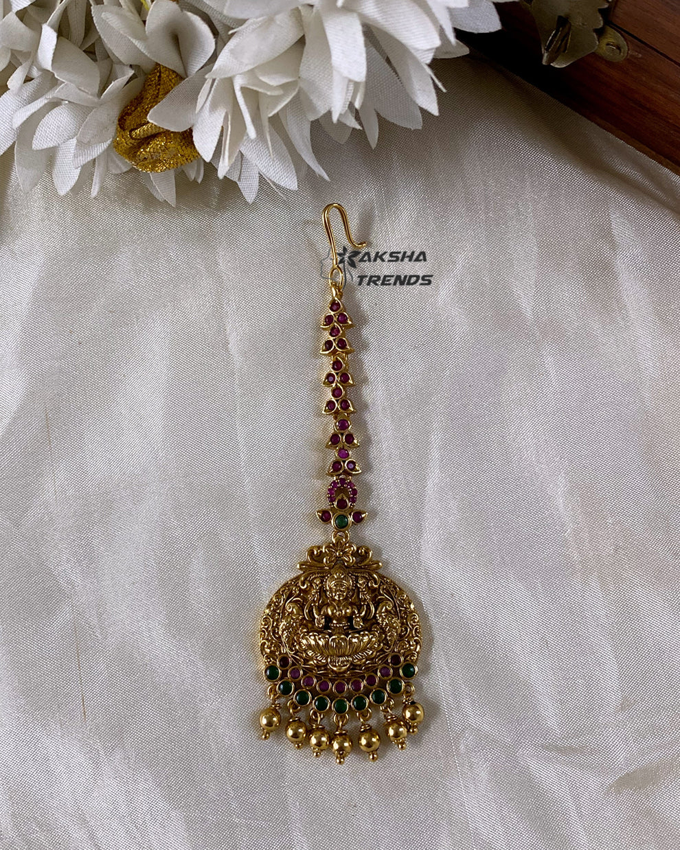 Premium gold tikka Aksha Trends 