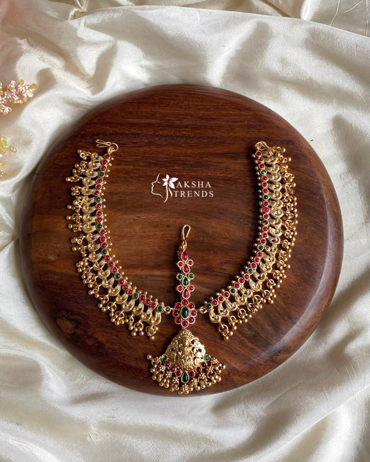 Bridal golden tikka Aksha Trends
