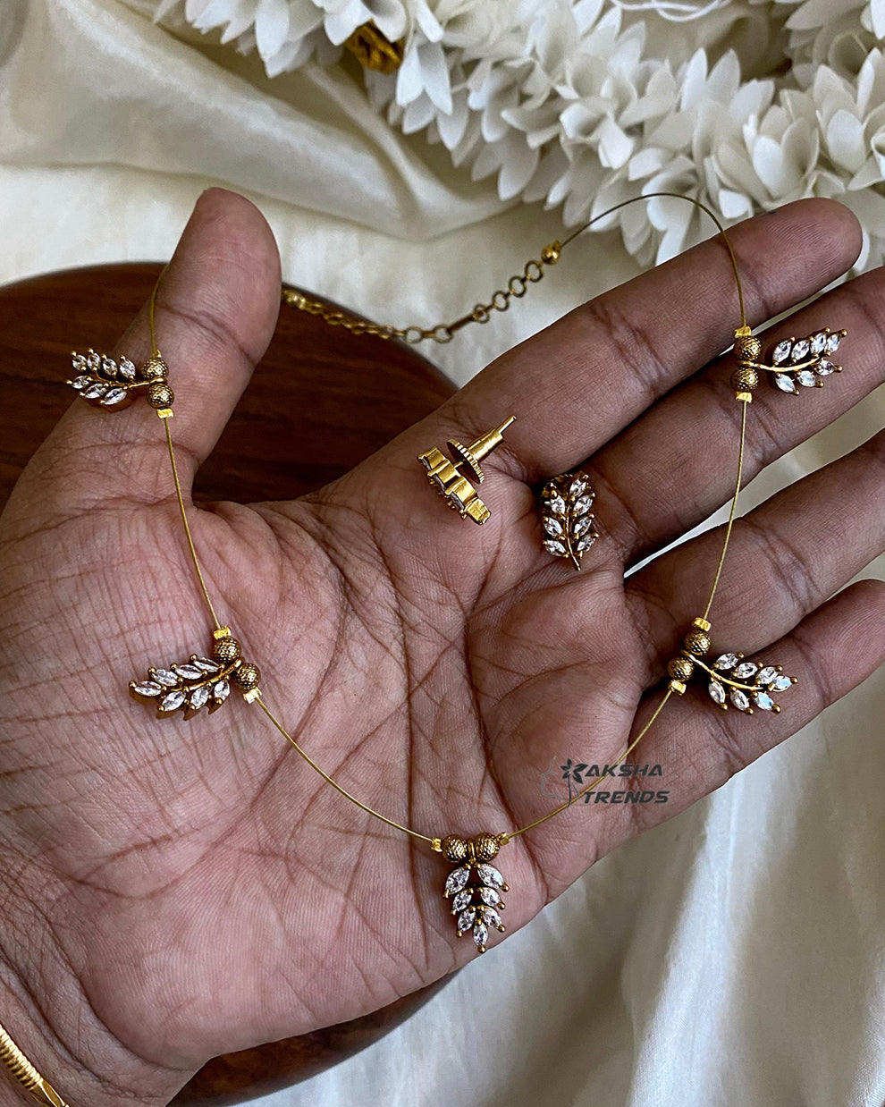 Invisible Necklace -leafy white Aksha Trends 