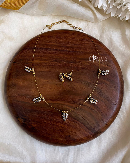 Invisible Necklace -leafy white Aksha Trends