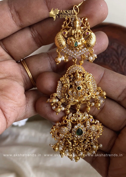 Premium gold bridal tikka Aksha Trends