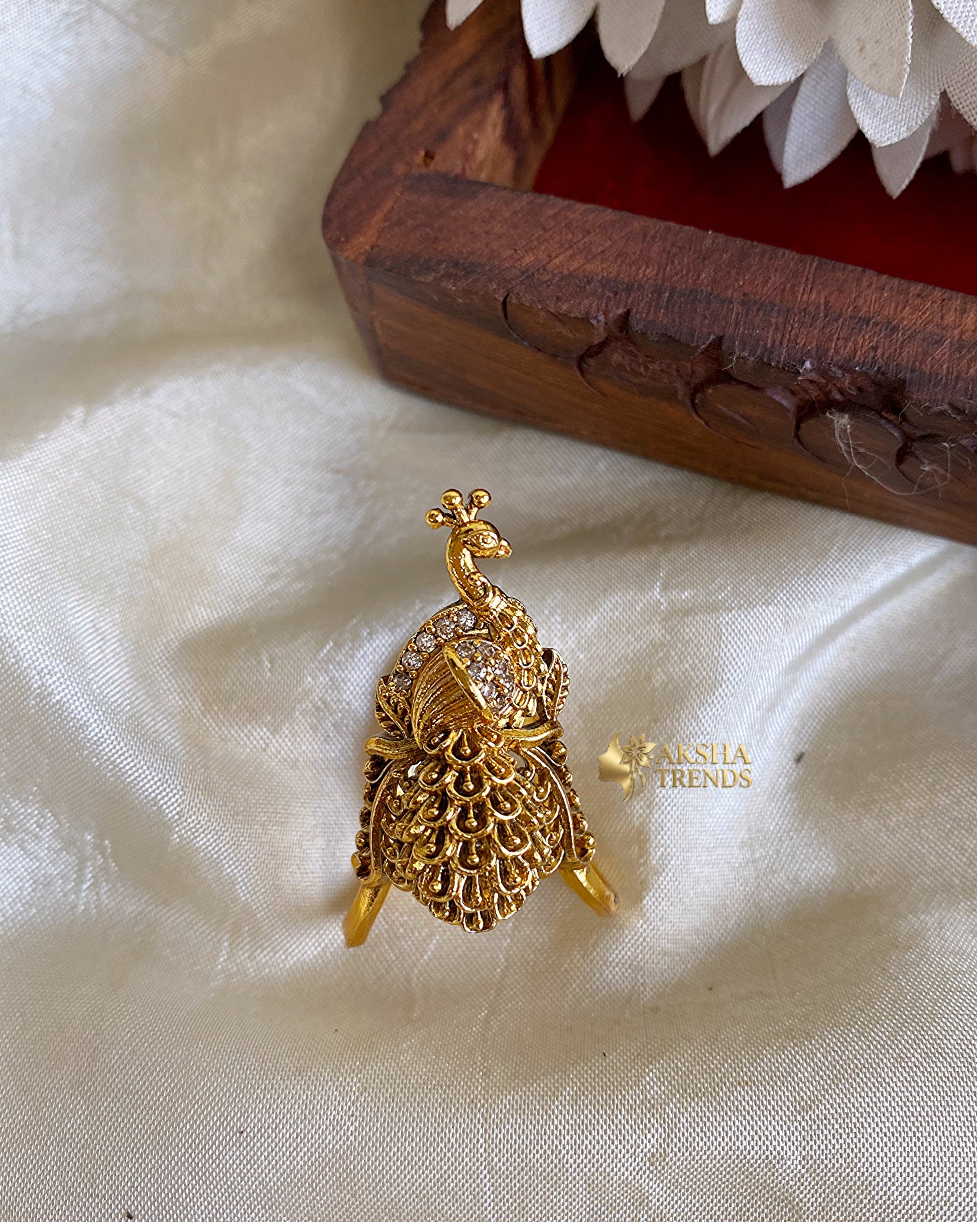 Peacock bridal vangi rings Aksha Trends