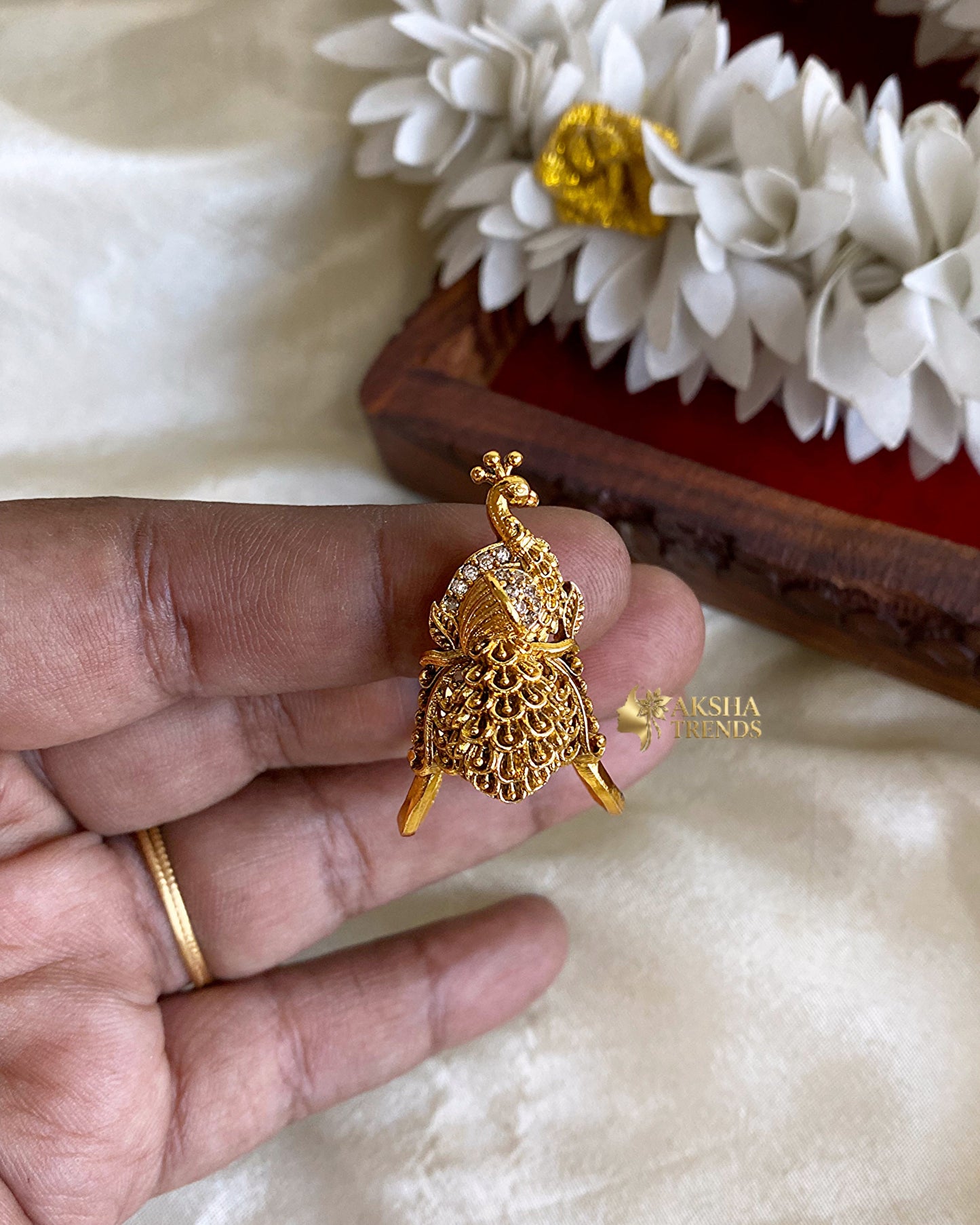 Peacock bridal vangi rings Aksha Trends
