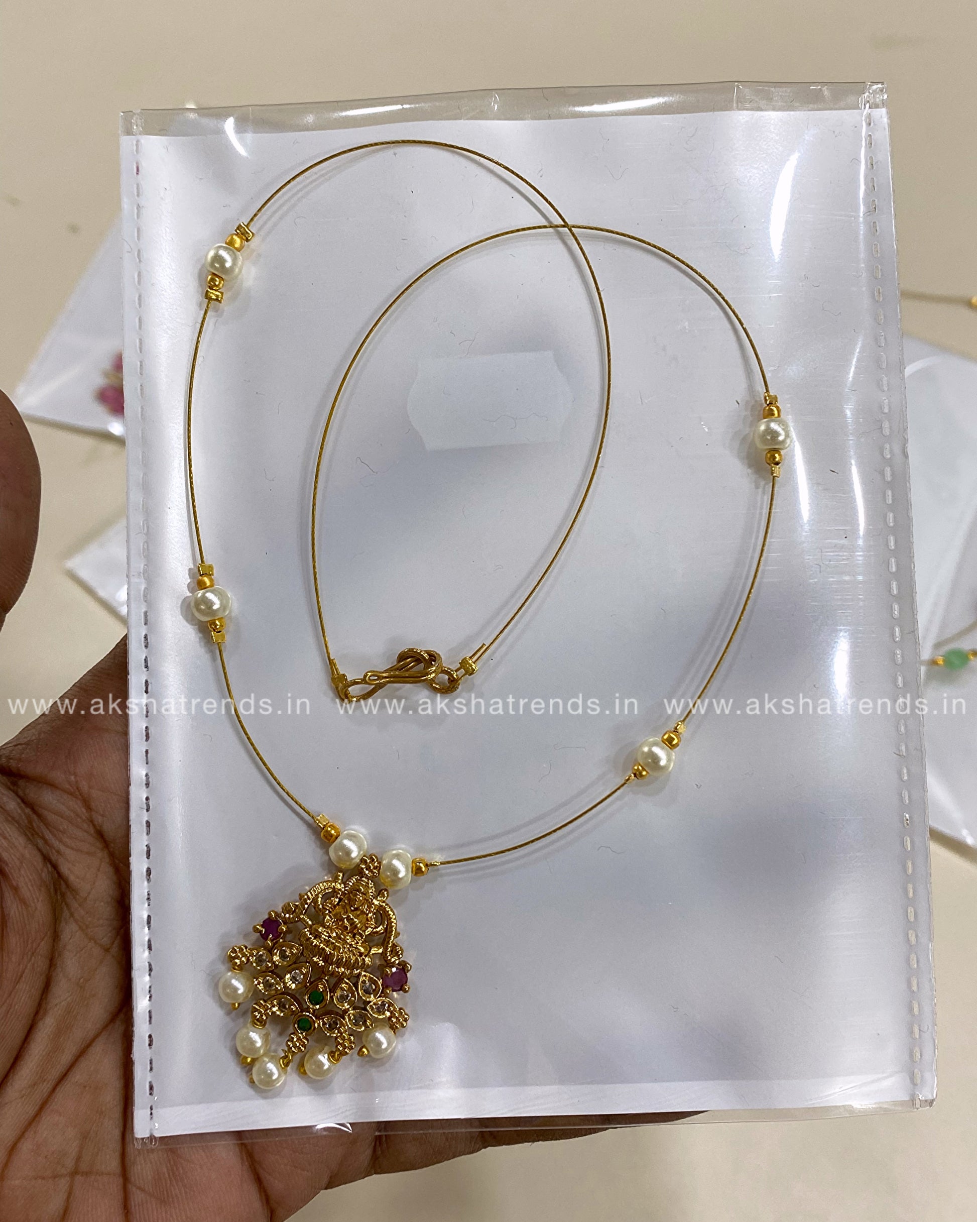 Invisible Necklace -Lakshmi pearl Aksha Trends