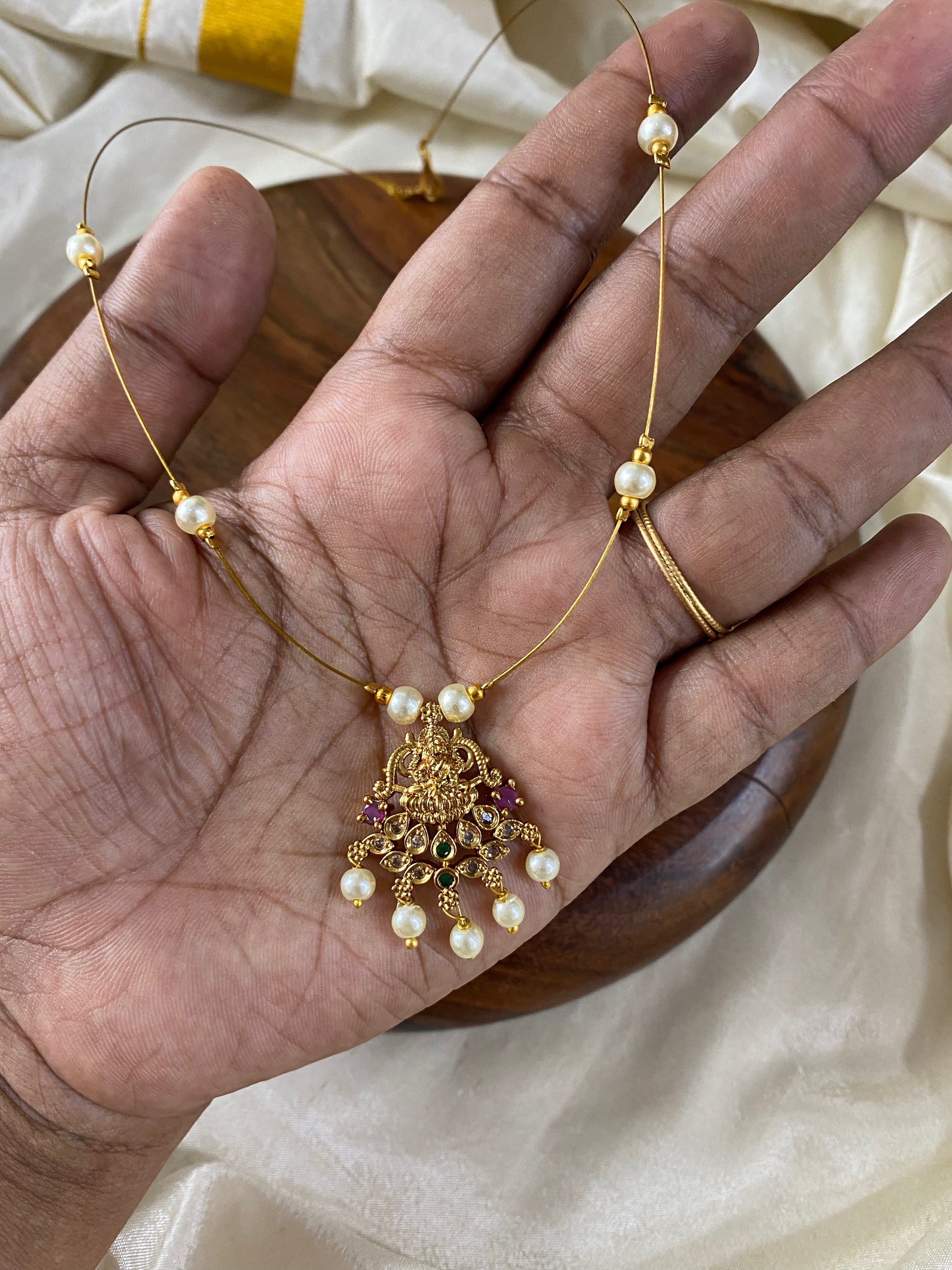Invisible Necklace -Lakshmi pearl Aksha Trends