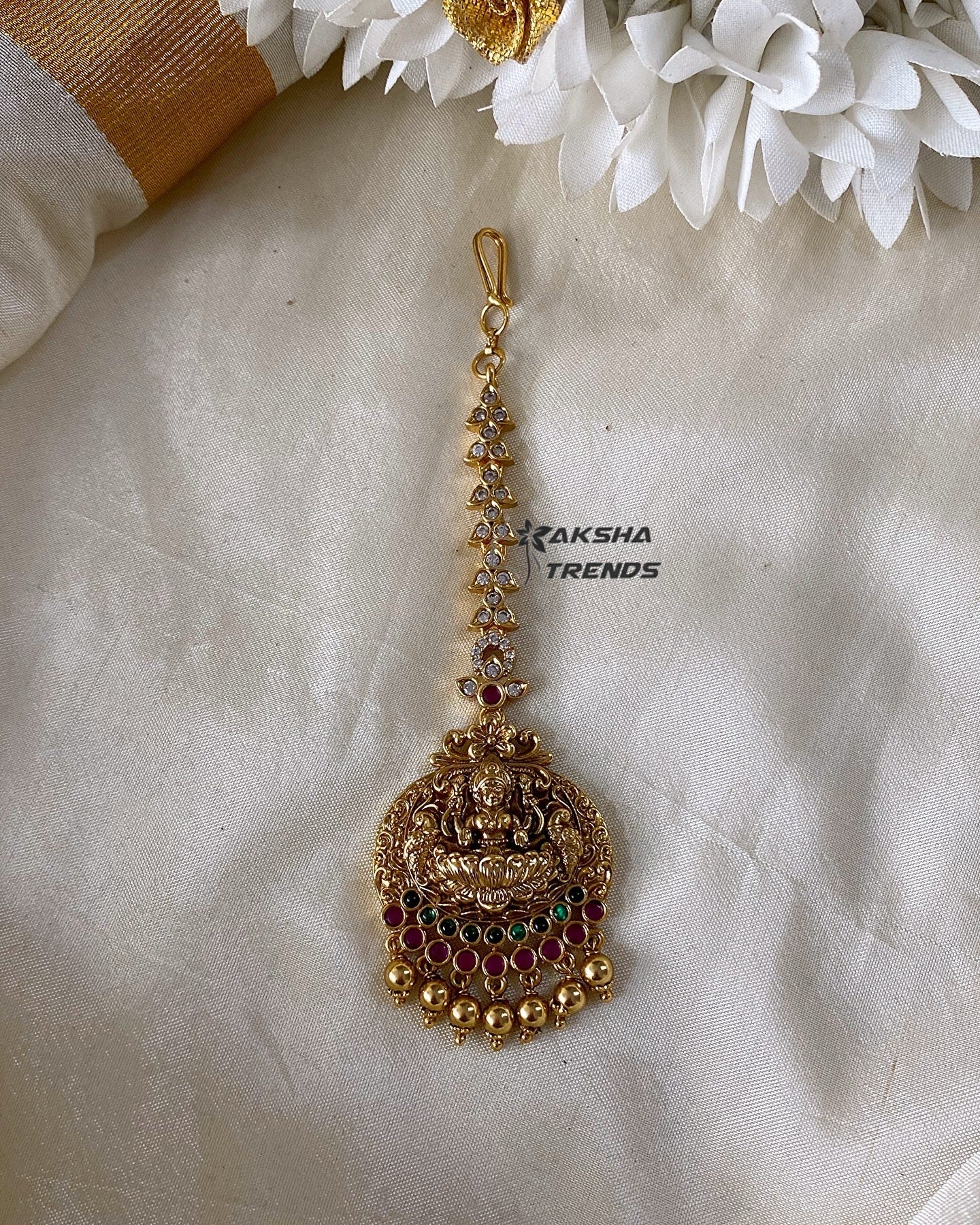 Premium bridal AD tikka Aksha Trends