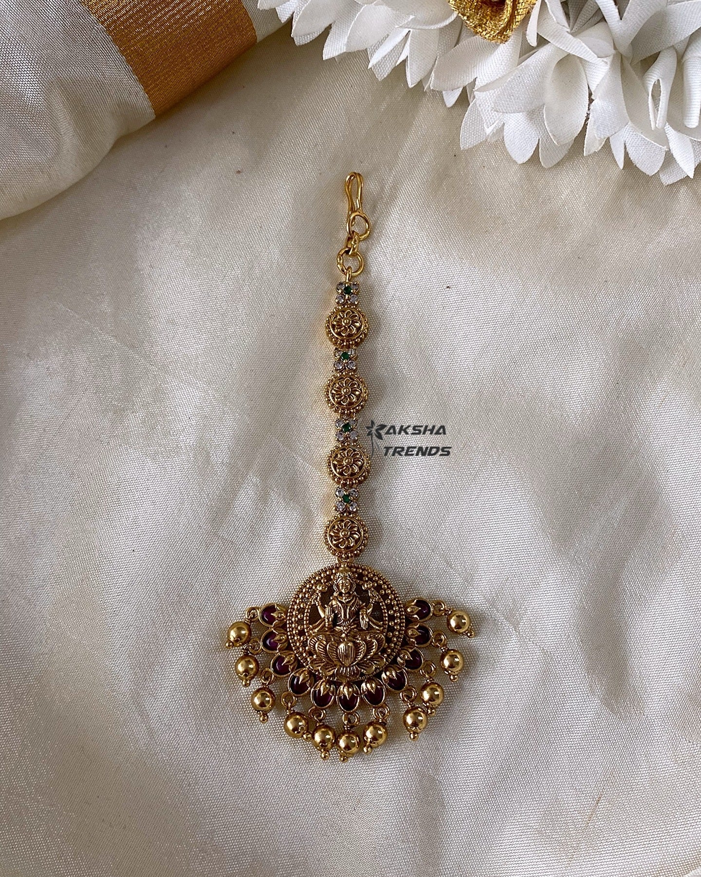 Premium bridal AD tikka Aksha Trends
