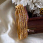 Premium gold stone bangles (4pc) Aksha Trends