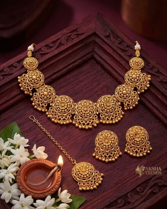 Antique golden floral choker with tikka Aksha Trends