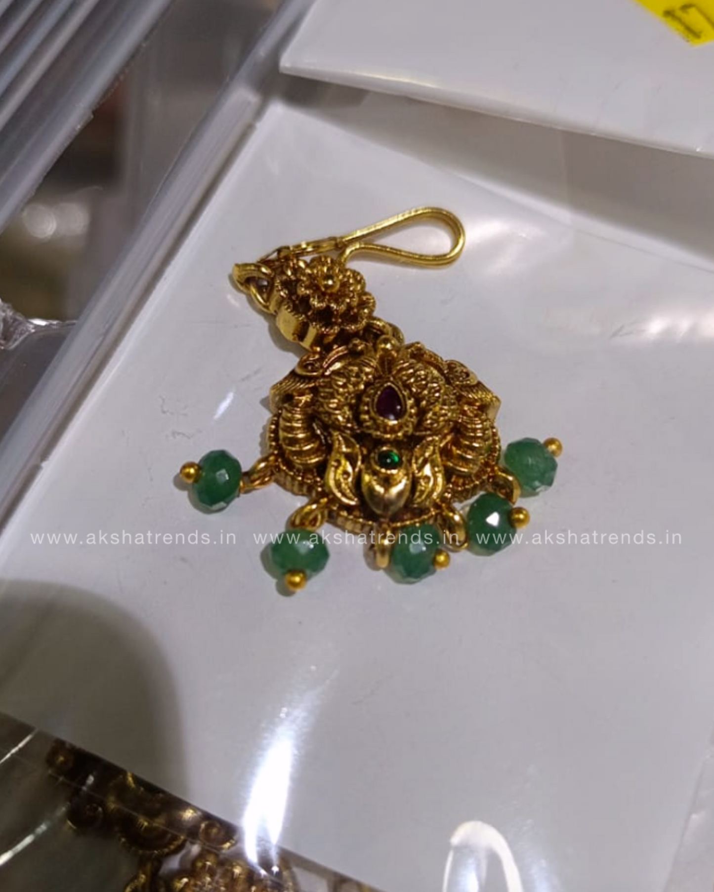 Premium gold tikka Aksha Trends