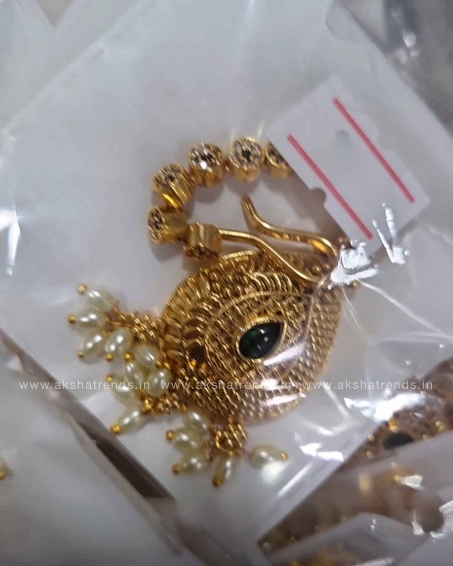 Premium gold tikka Aksha Trends