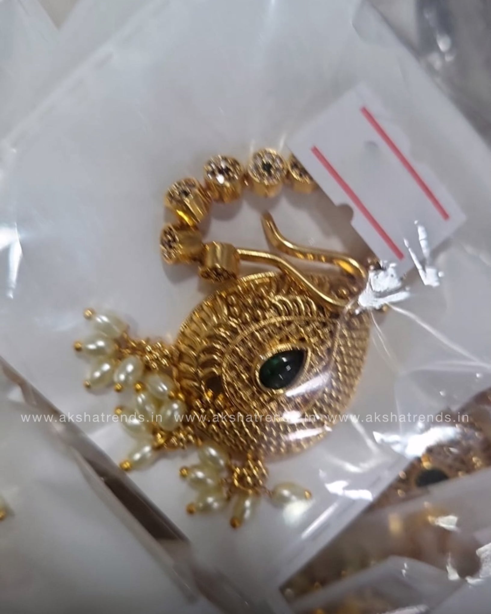 Premium gold tikka Aksha Trends