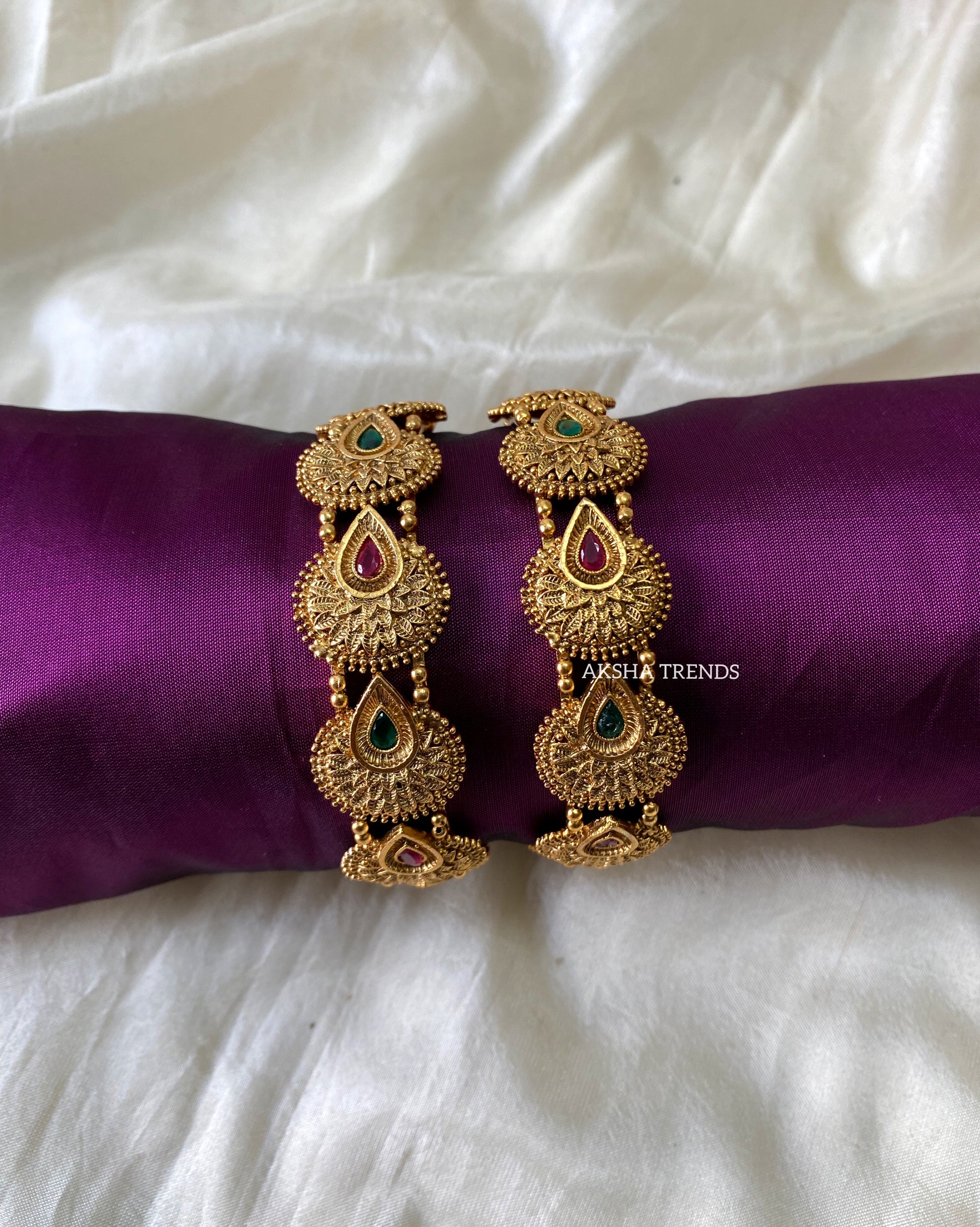 Premium gold bridal bangles Aksha Trends