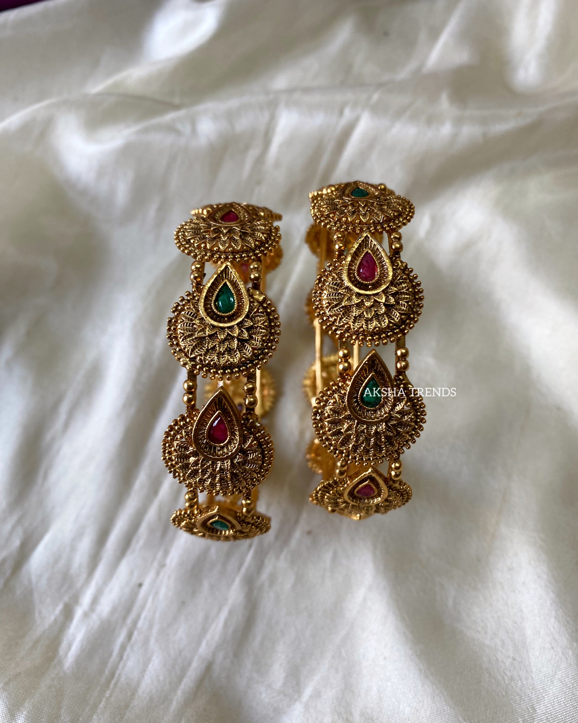 Premium gold bridal bangles Aksha Trends