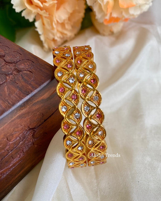 Gold polish Stone bangles Aksha Trends